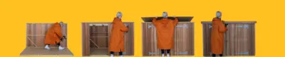 A lady putting together her Brighton Bike Shed over a bold yellow background
