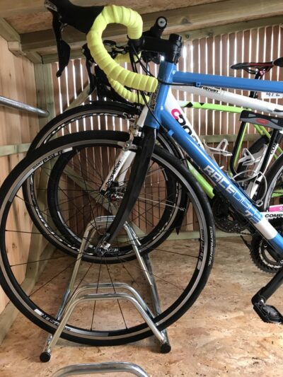 Bike stored in a shed, shown in a guide to summer versus winter bike storage